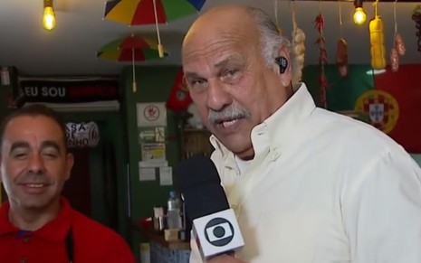 Márcio Canuto em restaurante durante reportagem do Comida Di Buteco exibida pelo SP1 em abril