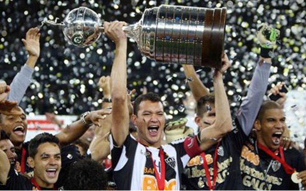 Réver, do Atlético-MG, comemora conquista da Libertadores: futebol lidera a audiência na TV por assinatura - Divulgação