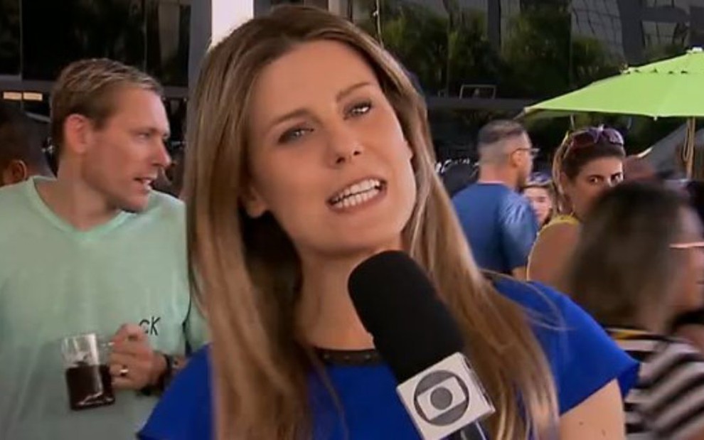 Daiana Garbin em sua última reportagem, sobre festival de churros, no SP TV de sábado - Reprodução/TV Globo