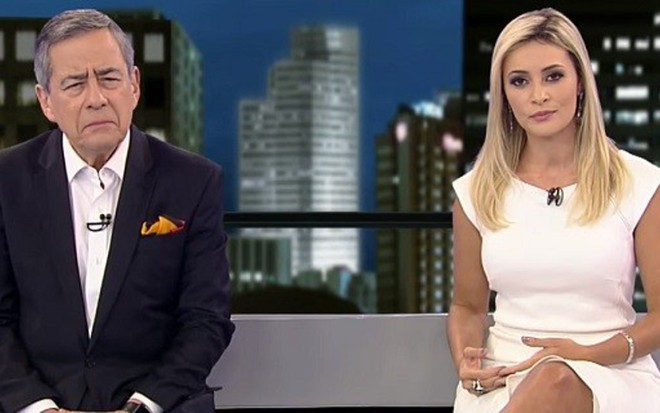 Paulo Henrique Amorim e Patrícia Costa durante o último Domingo Espetacular: sem diálogo - Reprodução/RecordTV