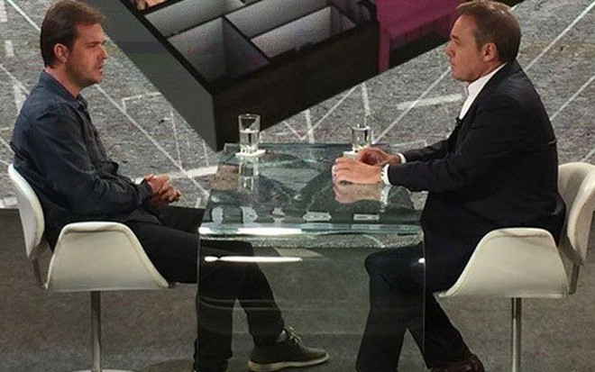 Gugu entrevista Elissandro Spohr, sócio da boate Kiss, no programa de ontem (30) - Reprodução/Record