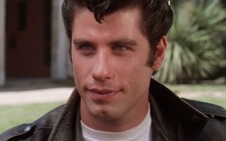 John Travolta interpretou Danny Zuko em Grease: sucesso com as adolescentes da época - Imagens: Divulgação