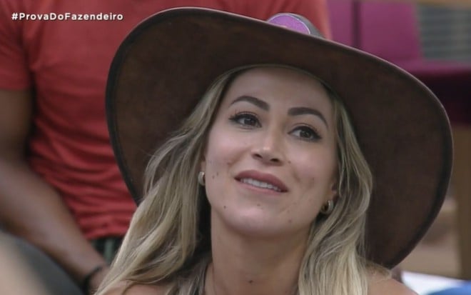 Imagem de Carol Narizinho com chapéu de fazendeira em A Fazenda 12