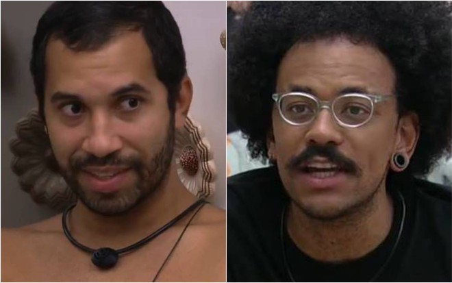 Gilberto olha para o lado, está sentado e está sem camisa; João olha para frente, usa camiseta preta e óculos de grau