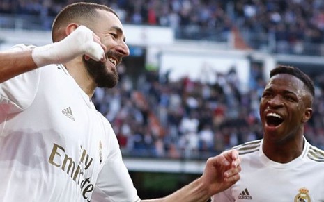 Sorridentes, Benzema e Vinícius Jr. comemoram gol do Real Madrid