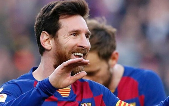 Lionel Messi, do Barcelona, sorri ao comemorar gol em jogo do Campeonato Espanhol