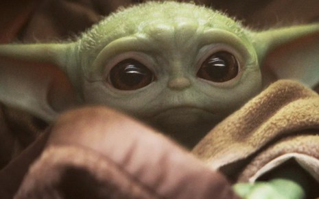 Baby Yoda em cena da série The Mandalorian, do Disney+