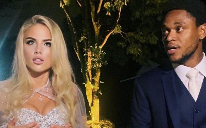 Imagem de Ekaterina Dorozhko vestida de noiva e Luiz Adriano de terno no dia do casamento
