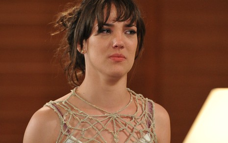 A atriz Adriana Birolli com expressão de indignação em cena como Patrícia de Fina Estampa (2011)