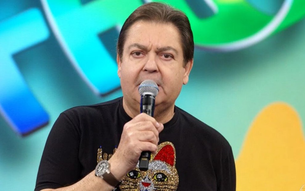 Fausto Silva apresenta o Domingão do Faustão, na Globo, em 22 de dezembro
