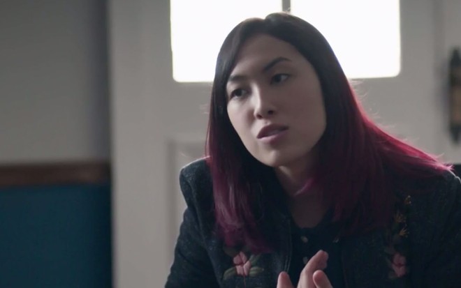 A atriz Ana Hikari caracterizada como a Tina em cena de Malhação: Viva a Diferença