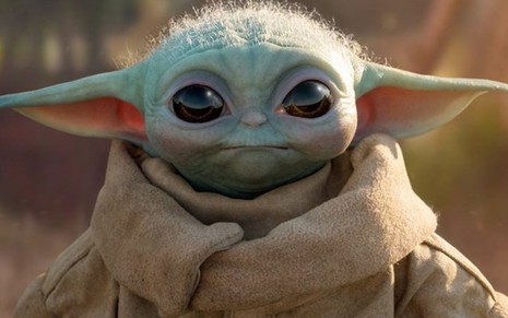 Baby Yoda em cena de The Mandalorian, série do Disney+