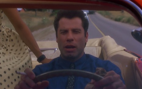 John Travolta em cena de Olha Quem Está Falando Também