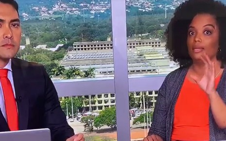 Kenzô Machida e Basilia Rodrigues na bancada da CNN Brasil nesta quinta-feira (19)