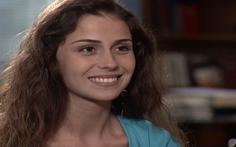 A atriz Giovanna Antonelli sorrindo em cena de Laços de Família