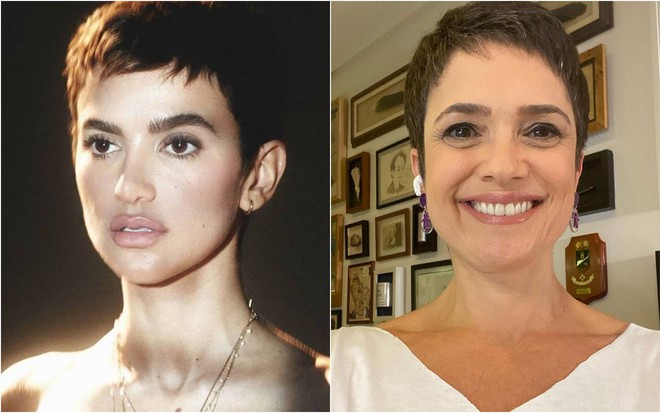 Manu está olhando para o lado, ela está com o cabelo castanho e curto e usa uma corrente no pescoço; Sandra sorri, está com o cabelo castanho e curto; ela usa camiseta branca