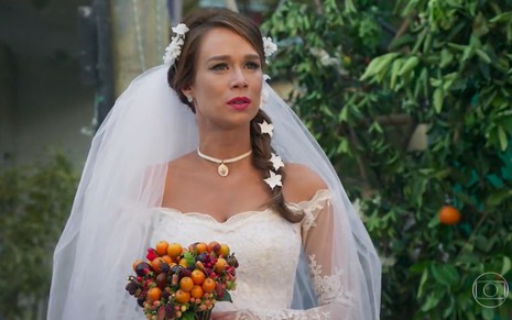 Tancinha (Mariana Ximenes) vestida de noiva em cena de Haja Coração