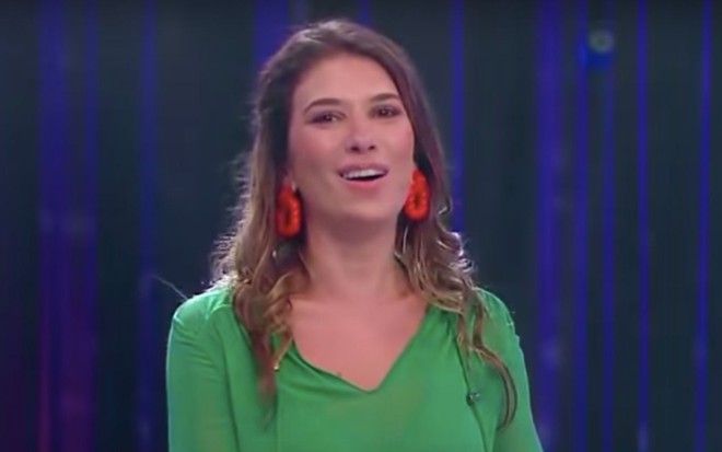 Rebeca Abravanel com blusa verde no Roda a Roda Jequiti