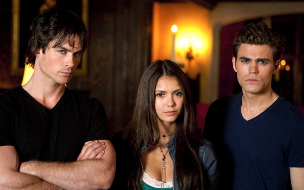 Ian Somerhalder (Damon), Nina Dobrev (Elena) e Paul Wesley (Stefan) caracterizados como os personagens de The Vampire Diaries