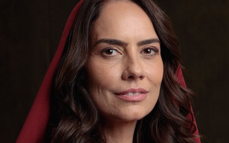 Adriana Prado como Mical na novela Reis