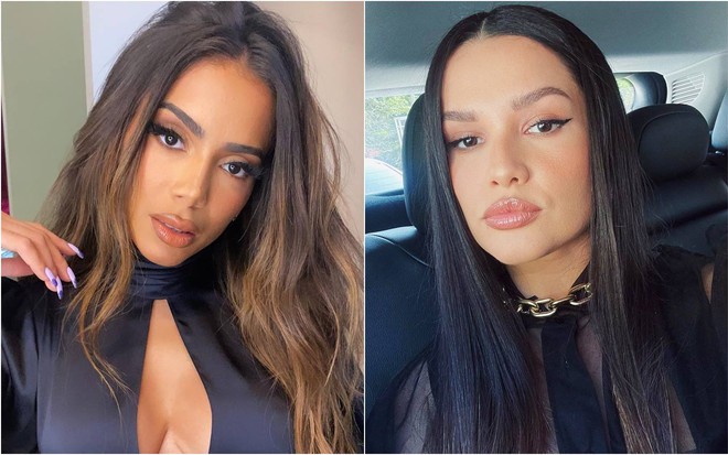 Anitta olha para a câmera, está com o cabelo solto e veste blusa preta; Juliette olha para a câmera, veste blusa preta e está com o cabelo solto