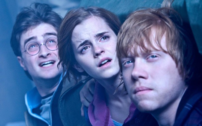 Daniel Radcliffe, Emma Watson e Rupert Grint em cena de Harry Potter e as Relíquias da Morte - Parte 2
