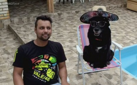 Foto de Valdemir Fidelis e a cachorra Laika em entrevista por videochamada ao Mais Você desta quarta-feira na Globo