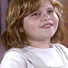 A atriz Thais Müller, com cerca de sete anos de idade, como a Fátima em cena de O Cravo e a Rosa