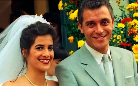 Os atores Lucia Veríssimo e Paulo Gorgulho vestidos como noiva e noivo em cena da novela Despedida de Solteiro
