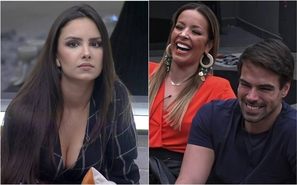 Geórgia olha para o lado, usa vestido preto e está com o cabelo solto; Renata está do lado de Leandro, ela veste blusa laranja e sorri; Leandro usa camiseta preta e sorri