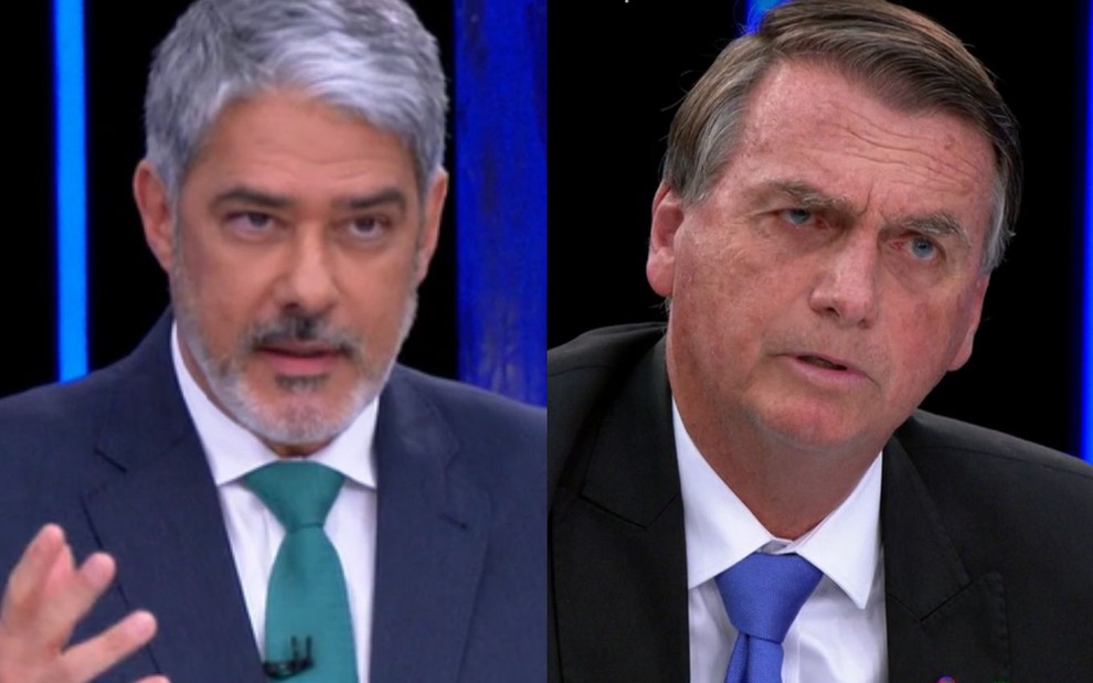 Bolsonaro com um terno preto e gravata azul no estúdio do Jornal Nacional