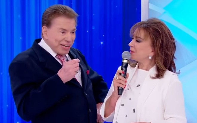 Silvio Santos, à esquerda, e Iris Abravanel, à direita