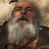 Velho do Rio (Osmar Prado) está deitado no chão com expressão de dor em cena da novela Pantanal