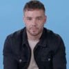 Foto mostra Liam Payne; ele veste camiseta clara e jaqueta preta