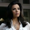 Eva Longoria posa com as mãos na cintura em cena de Desperate Housewives