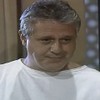 O ator Antonio Fagundes com expressão de deboche em cena de A Viagem (1994)