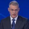 O âncora Eduardo Oneigue à frente do Jornal da Band