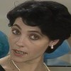 A atriz Christiane Torloni com expressão de surpresa em cena de A Viagem (1994)
