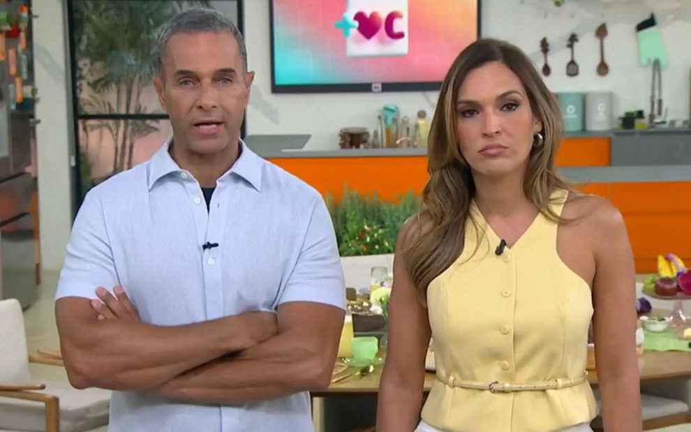 Fabricio Battaglini e Talitha Morete com expressões sérias no Mais Você
