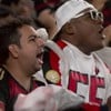 Torcedores do Flamengo gritam em jogo de futebol