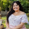 Castorine está caracterizada como Maria Divina, sua personagem em Êta Mundo Melhor!, da TV Globo