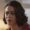 A atriz Carol Castro está séria em cena da novela Garota do Momento, da Globo, como Carice