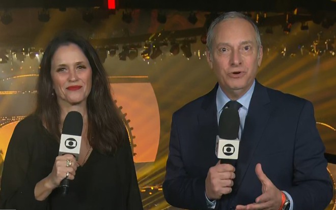 Ana Luiza Guimarães e José Roberto Burnier estão lado a lado durante o SP2 e o RJ2 desta segunda (28)