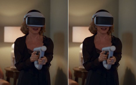 A atriz Debora Bloch como Odete Roitman segurando uma arma de plástico com óculos de realidade virtual em cena de Vale Tudo