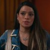 Ingrid Gaigher com expressão séria como Lucimar na novela Vale Tudo