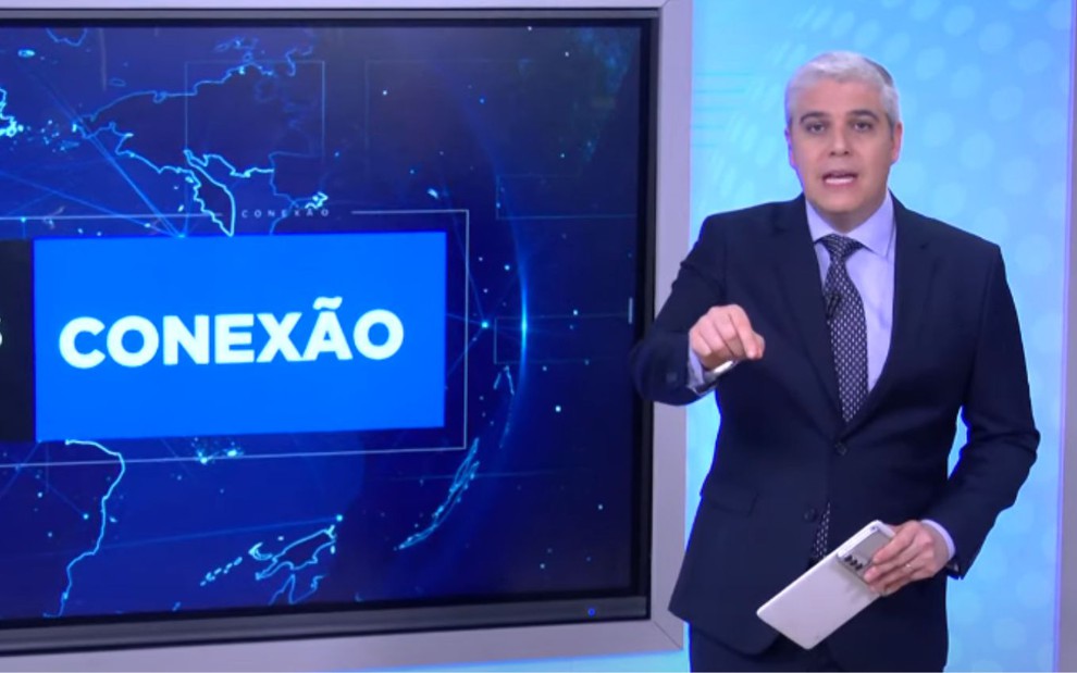 Marcelo Favalli no programa Conexão, da Times Brasil CNBC, de terno