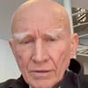 Sebastião Salgado com expressão séria
