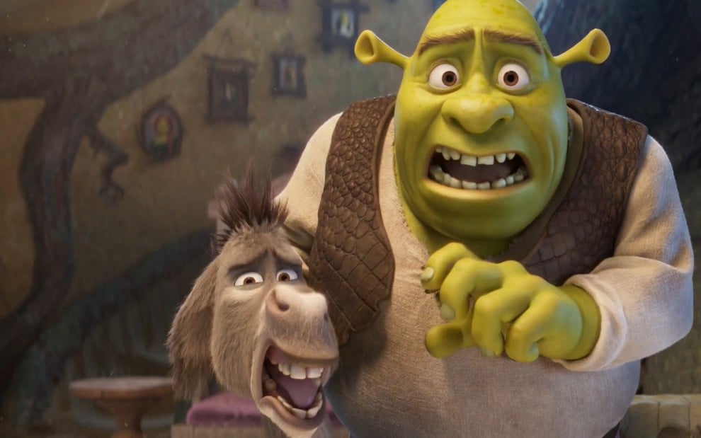 Burro e Shrek estão gritando em cena do filme; estilo de animação está bem diferente