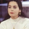 A atriz Suzy Rêgo com expressão séria em cena de A Viagem