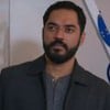 Thomás Aquino com expressão séria em cena da novela Vale Tudo